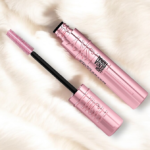 maybelline sky high mascara on a cream fluffy blanket